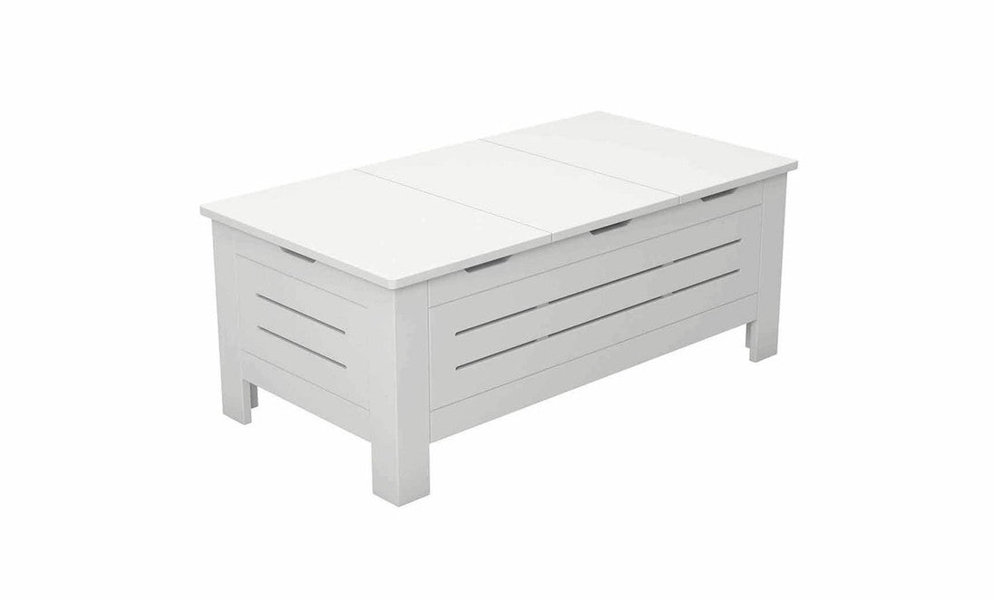 The Mainstay Storage Coffee Table by Ledge Lounger is a white wooden piece with a modern design. It features paneled sides with horizontal slats, ample storage space, and stands gracefully on four short legs, making it a stylish addition to your living room.