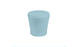 The Affinity Side Table by Ledge Lounger is a light blue, cylindrical piece with a slightly rounded top, ideal as an outdoor accessory and displayed against a white background.