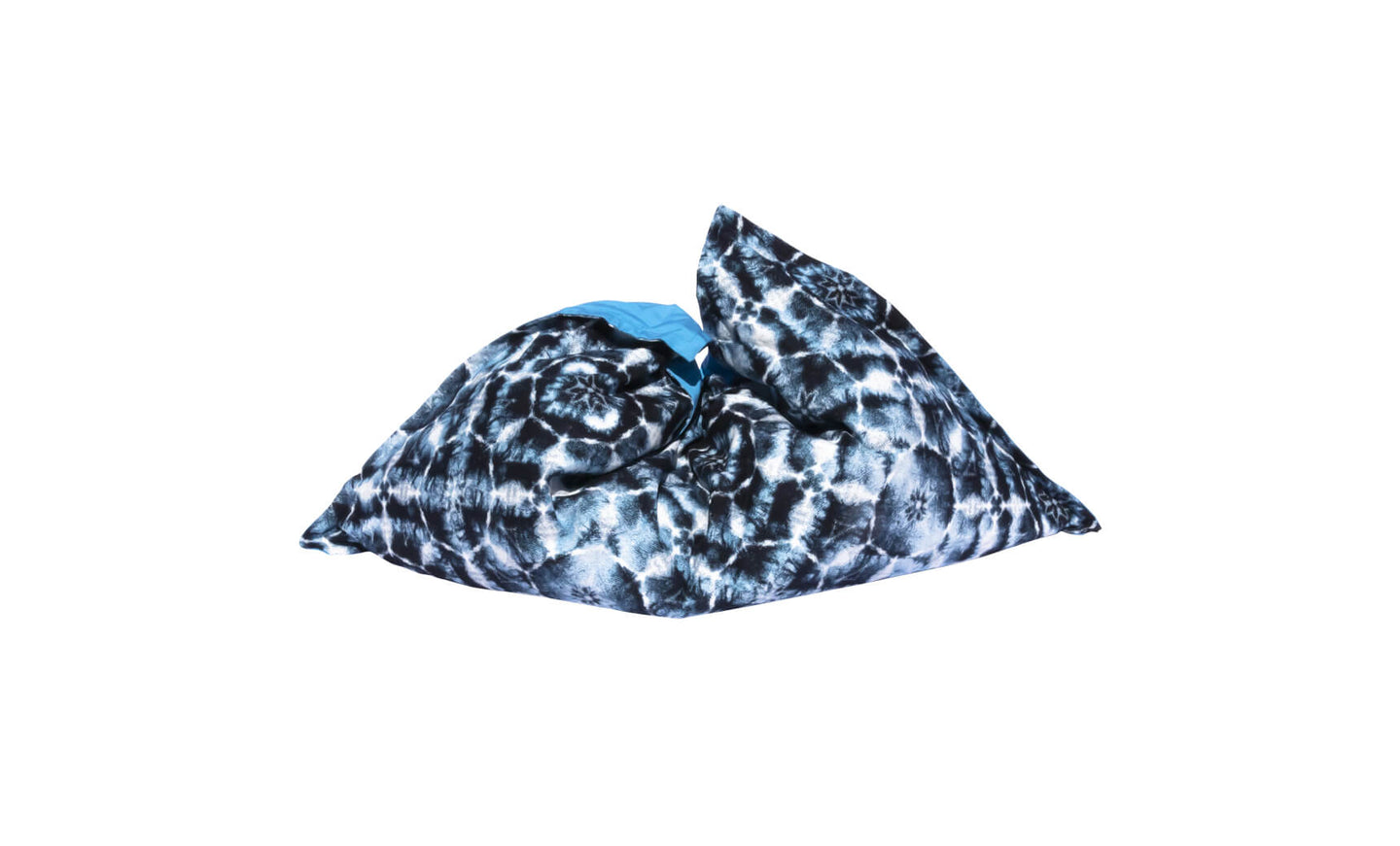 The Laze Pillow by Ledge Lounger is a large, soft bean bag featuring a black and white tie-dye pattern with a touch of blue, ideal for outdoor lounging or as a floating pool cushion, shown on a plain white background.