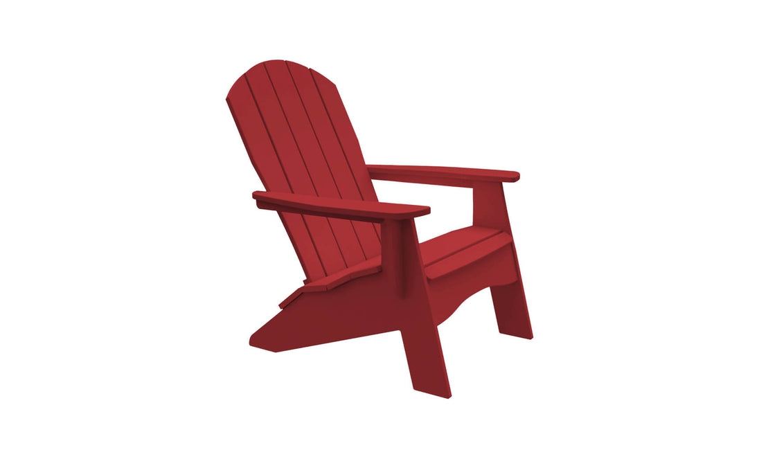 The Legacy Adirondack by Ledge Lounger is a red chair with wide armrests and a slatted back, angled slightly left. Ideal for patio gatherings, this classic outdoor furniture piece is isolated on a white background.
