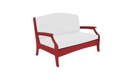 Enhance your outdoor space with the Legacy Loveseat by Ledge Lounger, featuring a striking red wooden frame and armrests with white cushions, perfect for adding cushioned comfort to any setting.