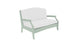 The Ledge Lounger Legacy Loveseat, a light green wooden bench with white cushioned seat and backrest, features curved armrests and a simple yet elegant design. Perfect for any outdoor space, its charm stands out against the white background.