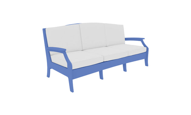 The Ledge Lounger Legacy Sofa is a modern deep-seat outdoor piece with light blue frames and white cushions, featuring durable outdoor fabrics. It offers three seating spots and gently curved armrests, set against a plain white backdrop.