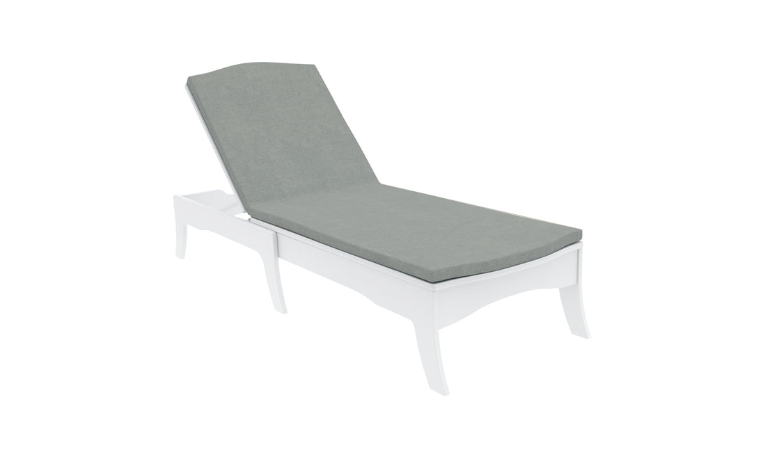 A white wooden lounge chair with a Legacy Chaise Cushion by Ledge Lounger features a reclining backrest. Its showcased against a white background, highlighting its modern design and durable gray outdoor fabric, perfect for customization.