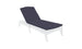 The sleek outdoor chaise lounge, set against a pristine white backdrop, showcases a dark Legacy Chaise Cushion by Ledge Lounger. Its modern design features curved legs and an adjustable backrest, with customization using premium outdoor fabric for enduring comfort and elegance.
