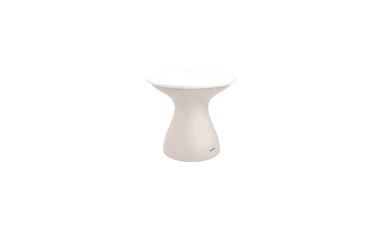 The Autograph Standard Side Table by Ledge Lounger, featuring an hourglass shape with a smooth surface and slightly flared base, is displayed on a white background.