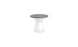 A modern, hourglass-shaped stool featuring a sleek gray top and glossy white base resembles the Autograph Standard Side Table by Ledge Lounger. Its minimalistic, contemporary design suits various interior styles.