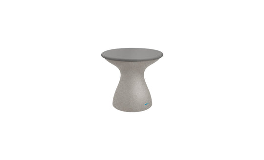 The Autograph Standard Side Table by Ledge Lounger features a small, modern round table with a sleek gray top and a smooth curved pedestal base. Its textured gray base complements the tabletop, making it perfect for stylish poolside storage.