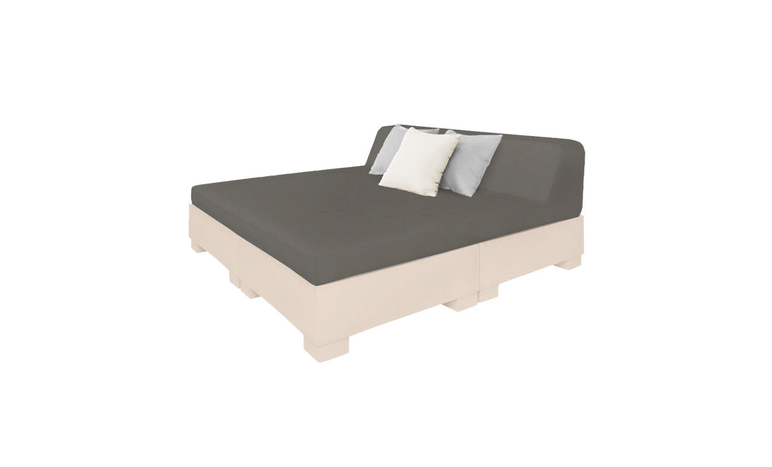 The Affinity Square Sunbed with Backrest Cushion by Ledge Lounger is ideal for outdoor relaxation, featuring a minimalist design with a gray mattress and beige base, complemented by two white and one light gray pillow against a plain white background. Perfect for enhancing serene poolside spaces.