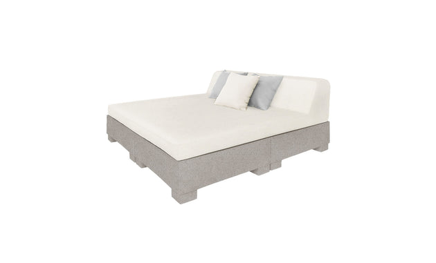 Introducing the Affinity Square Sunbed with Backrest Cushion by Ledge Lounger, a minimalist outdoor bed featuring a light gray base, white mattress, and three pillows (two gray, one white). Perfect for poolside relaxation with no visible frame or headboard.