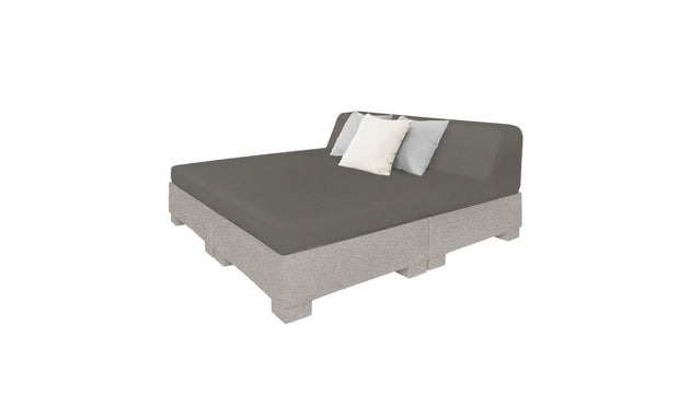 The Affinity Square Sunbed with Backrest Cushion by Ledge Lounger is a modern, minimalist piece featuring a gray platform base, dark gray mattress, backrest, and two light pillows on the left side, perfect for stylish poolside relaxation.