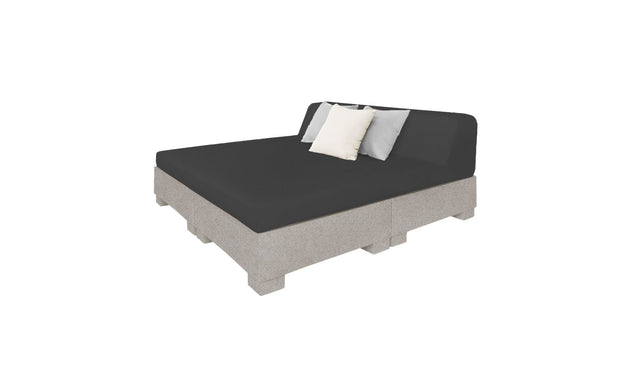 Introducing the Affinity Square Sunbed with Backrest Cushion by Ledge Lounger. This modern, minimalist daybed features a gray fabric base crafted from wooden pallets, a black cushion, and two pillows—one white and one light gray—making it perfect for poolside relaxation or any outdoor space.