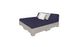 The Ledge Lounger Affinity Square Sunbed with Backrest Cushion features a minimalist, rustic design with a dark blue mattress and two light-colored pillows, one white and one grey, crafted from wood pallets. Its ideal for poolside relaxation or enhancing your outdoor space.