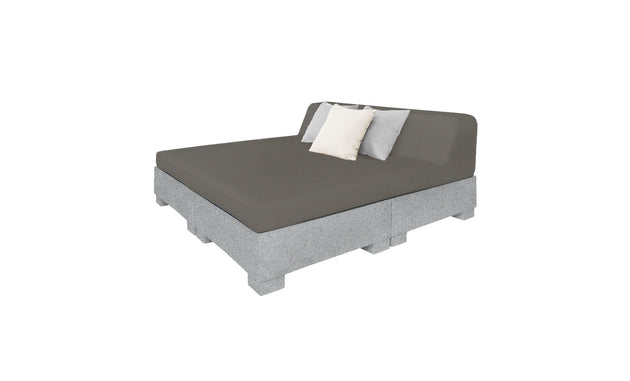 Introducing the Affinity Square Sunbed with Backrest Cushion by Ledge Lounger: a minimalist poolside bed featuring a gray mattress on a pallet-style base, two white pillows, one gray pillow, and set against a crisp white background. Perfect for enhancing any outdoor space.