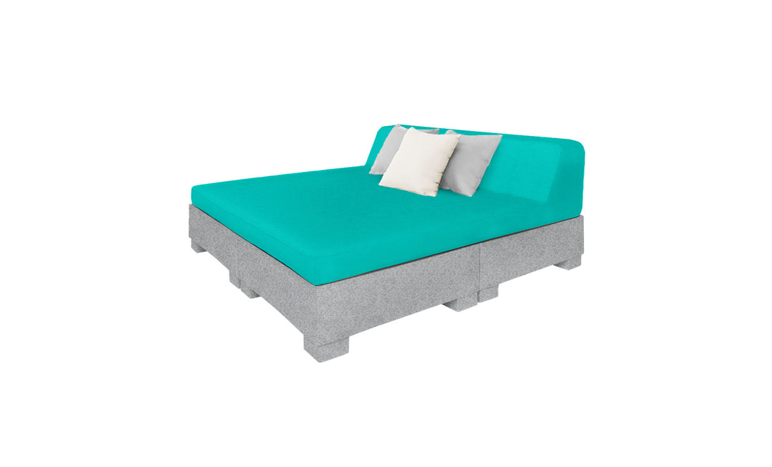 Meet the Affinity Square Sunbed with Backrest Cushion by Ledge Lounger: a modern design featuring a turquoise mattress and gray frame with a cushioned headrest. Perfect for poolside lounging, it includes one white and one gray pillow, offering minimalistic and contemporary style for any outdoor area.