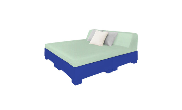 The Affinity Square Sunbed by Ledge Lounger boasts a light green mattress and two pillows (white and gray). With its blue frame and sleek design, its perfect for poolside relaxation. A crisp white backdrop enhances its modern appeal in your outdoor space.