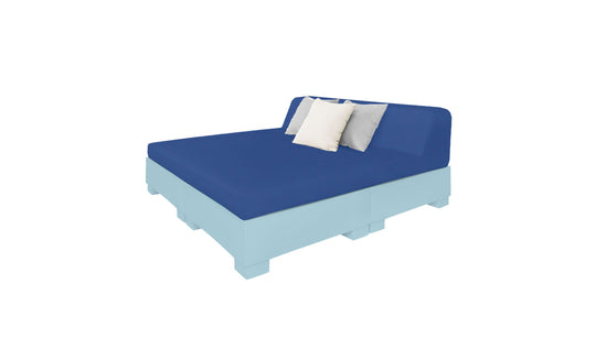 Featuring a light blue pallet-style bed frame with a blue mattress, two white pillows, and one gray pillow, this setup evokes the Affinity Square Sunbed with Backrest Cushion by Ledge Lounger for perfect poolside relaxation against a pure white backdrop.