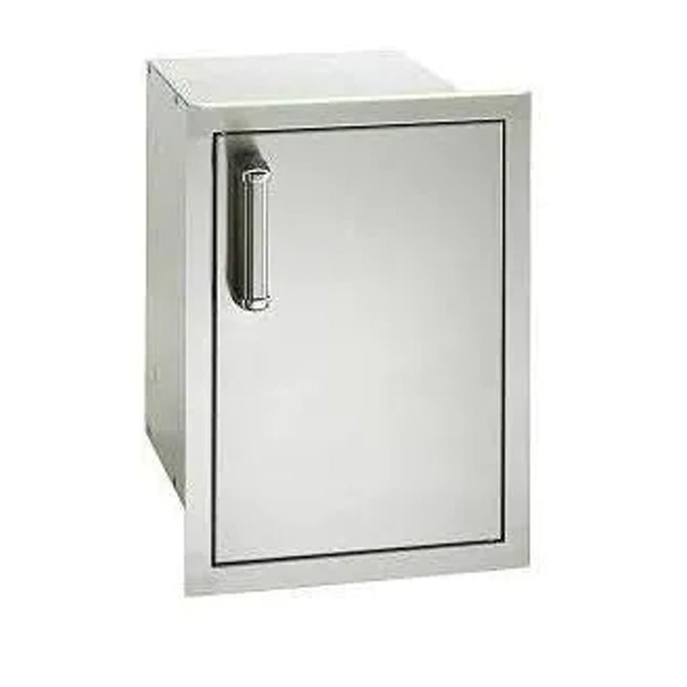 Fire Magic Premium flush-mounted grill with soft close door and dual drawers below.