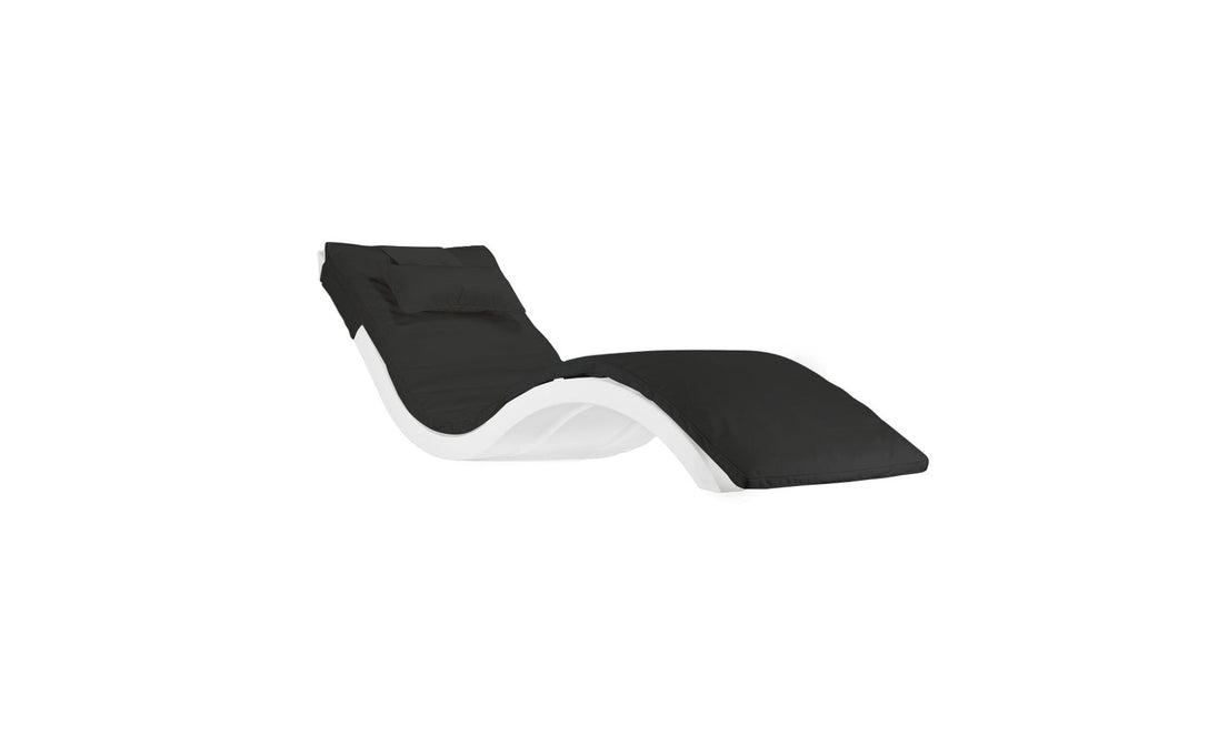 The Ledge Lounger Signature Chaise Cushion showcases a sleek, modern design with a white wavy frame and black cushions, complemented by a single headrest pillow. Perfect for contemporary spaces, it seamlessly fits against a plain white backdrop.