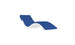 The Ledge Lounger Signature Chaise Cushion is a modern wave-shaped lounge chair with a sleek white frame and blue cushioning, featuring a plush headrest pillow, set against a white background.