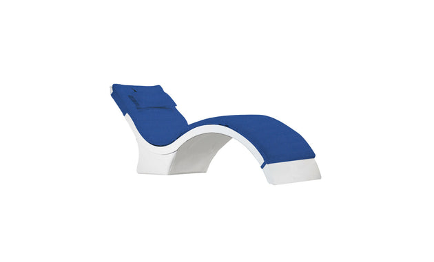 The Ledge Lounger Signature Chaise Cushion is a modern, minimalist lounge chair with a white frame and blue cushion. It features an ergonomic curve and headrest pillow, ideal for indoor or outdoor relaxation in contemporary style.