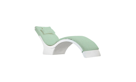 The Ledge Lounger Signature Chaise Cushion is a modern, ergonomic lounge chair with a sleek white base and mint green fabric. It boasts a curved structure and headrest pillow for ultimate relaxation.