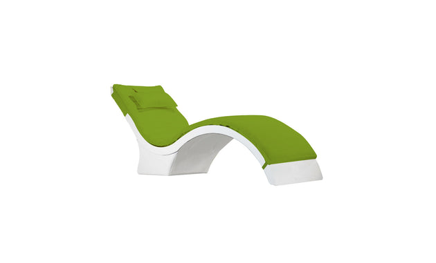 The Ledge Lounger Signature Chaise Cushion features a modern, curved design with a white base and green cushioning, complete with an integrated headrest pillow, set against a white background.