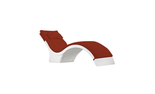 Unwind with the Signature Chaise Cushion from Ledge Lounger. This modern white chaise lounge boasts a sleek, curved design with red cushioning and features an ergonomic backrest and upward-arching footrest for contemporary comfort.