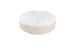 The Signature Round Sunbed by Ledge Lounger features a white cushioned top with a central tufted button detail and a beige base, making it an ideal spot for relaxation in your outdoor space.