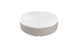 The Signature Round Sunbed by Ledge Lounger features a modern round design with a light gray fabric base and a white cushioned top with central tufted button, perfect for adding style and comfort to any patio or garden.