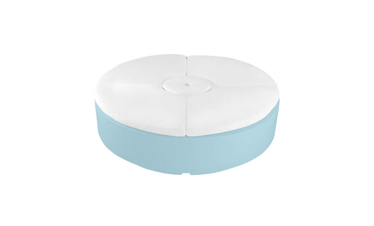 The Signature Round Sunbed by Ledge Lounger features a light blue base and white cushioned top, perfect for enhancing any outdoor space. Its tufted design with a central button adds modern appeal, combining style and relaxation.