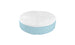 The Signature Round Sunbed by Ledge Lounger features a light blue base and white cushioned top, perfect for enhancing any outdoor space. Its tufted design with a central button adds modern appeal, combining style and relaxation.