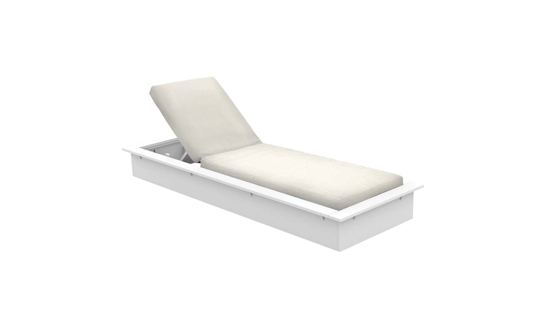 The Echo Chaise by Ledge Lounger is a white adjustable lounger with a cream cushion, ideal for outdoor spaces. Its slightly elevated backrest makes it perfect for relaxing in style against a light backdrop.