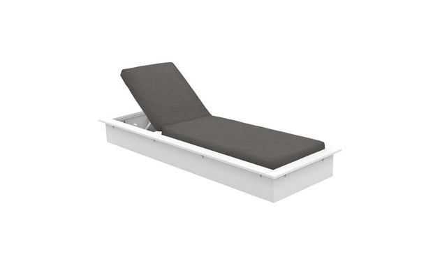 The Echo Chaise by Ledge Lounger is a white outdoor lounger featuring an adjustable backrest and a dark green cushion. Its modern design provides clean lines and minimalist appeal, making it perfect for enhancing any outdoor space with elegance.