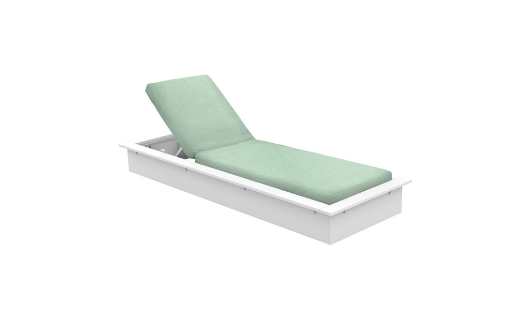 The Echo Chaise by Ledge Lounger, featuring a white frame and light green cushion, elegantly reclines with its adjustable backrest, adding comfort to any outdoor space. It is showcased against a plain white background.