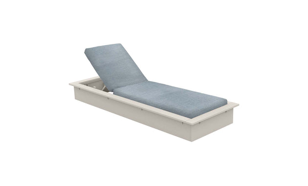 The Echo Chaise by Ledge Lounger is a modern outdoor piece with a light gray frame and teal cushions, ideal for any outdoor area. Its slightly reclined backrest boasts clean lines and adjustable positioning, making its minimalist design pop against a white backdrop.