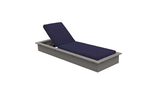 The Echo Chaise by Ledge Lounger, featuring a gray rectangular base with a navy blue cushion and adjustable backrest, is ideal for any outdoor space. Set against a plain white backdrop, it provides both comfort and style.