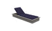 The Echo Chaise by Ledge Lounger, featuring a gray rectangular base with a navy blue cushion and adjustable backrest, is ideal for any outdoor space. Set against a plain white backdrop, it provides both comfort and style.