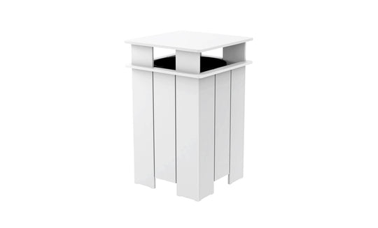 The Mainstay Trash Bin by Ledge Lounger is a tall, white, boxy planter with vertical slats and a flat top featuring a black inner pot. Ideal for indoor or outdoor use, it boasts UV-stable materials and clean lines for a modern aesthetic.