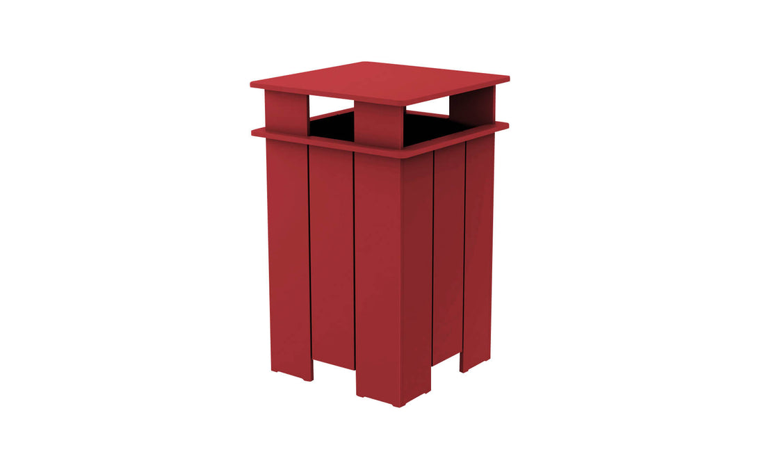 The Ledge Lounger Mainstay Trash Bin is a tall, red, rectangular patio can with vertical slats and a flat top, crafted from UV stable materials. Its open center and sleek modern design ensure functionality and durability for outdoor use.