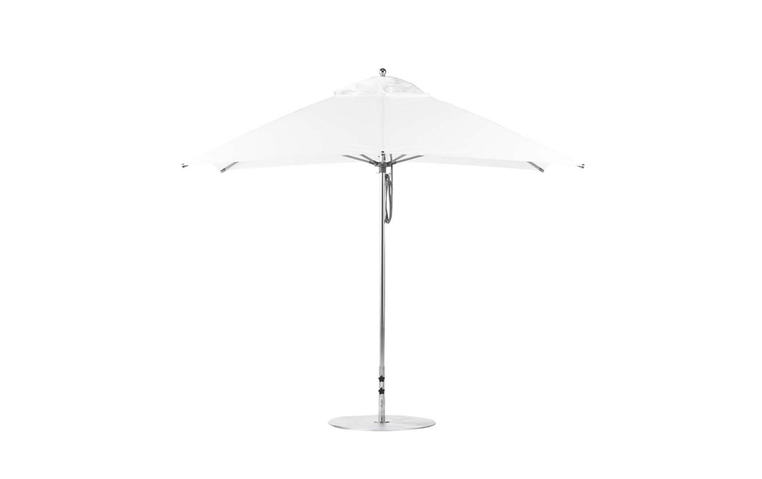 The Ledge Lounger Essential Fiberglass Umbrella - 10 Square Pulley features a sleek, modern design with a metallic pole and round base. Its marine-grade fabric canopy is fully open, offering clean lines and minimalistic elegance for lasting outdoor durability.