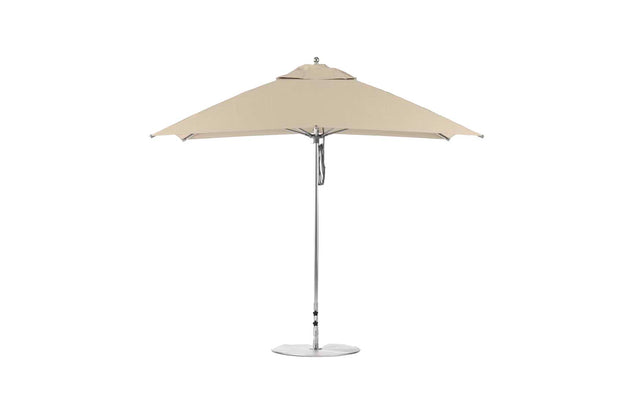 The Ledge Lounger Essential Fiberglass Umbrella, featuring a 10 square canopy made from marine-grade fabrics and a central silver pole, is securely supported by one of the reliable bases on a flat circular foundation.