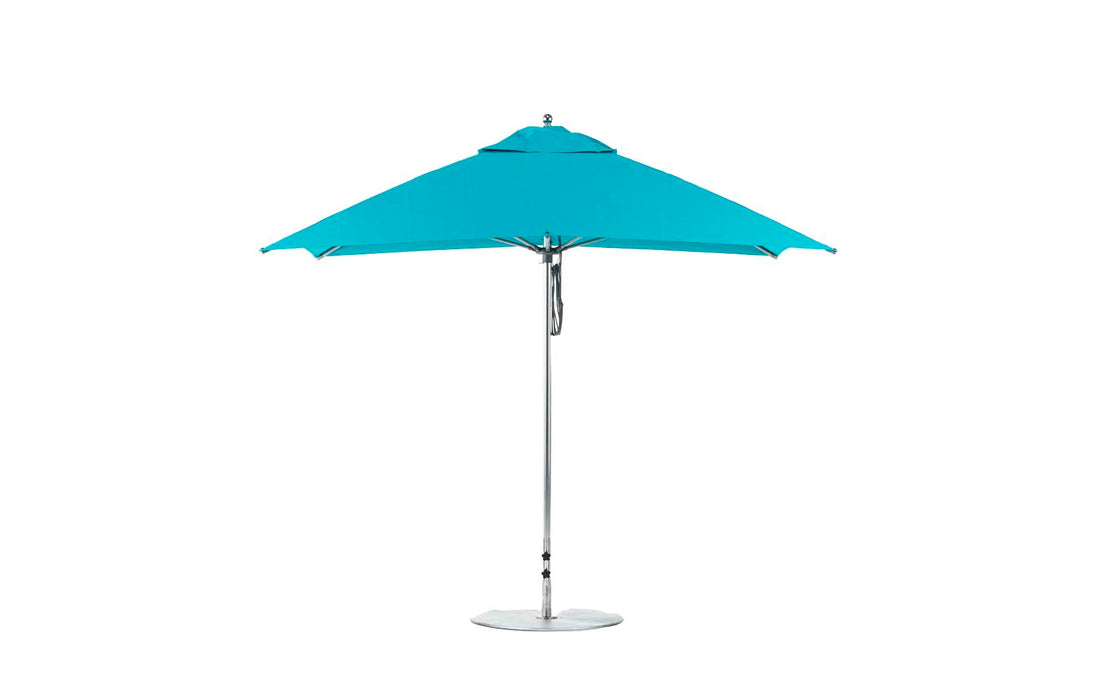 The Essential Fiberglass Umbrella - 10 Square Pulley by Ledge Lounger, in bright turquoise with marine-grade fabrics, a sleek silver pole, and a round durable base, stands open against a plain white background, showcasing its simple modern design.