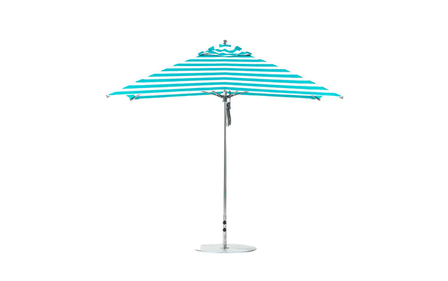 The Ledge Lounger Essential Fiberglass Umbrella - 10 Square Pulley features blue and white stripes standing upright on a sturdy metal stand, crafted with marine-grade fabrics that ensure durability.