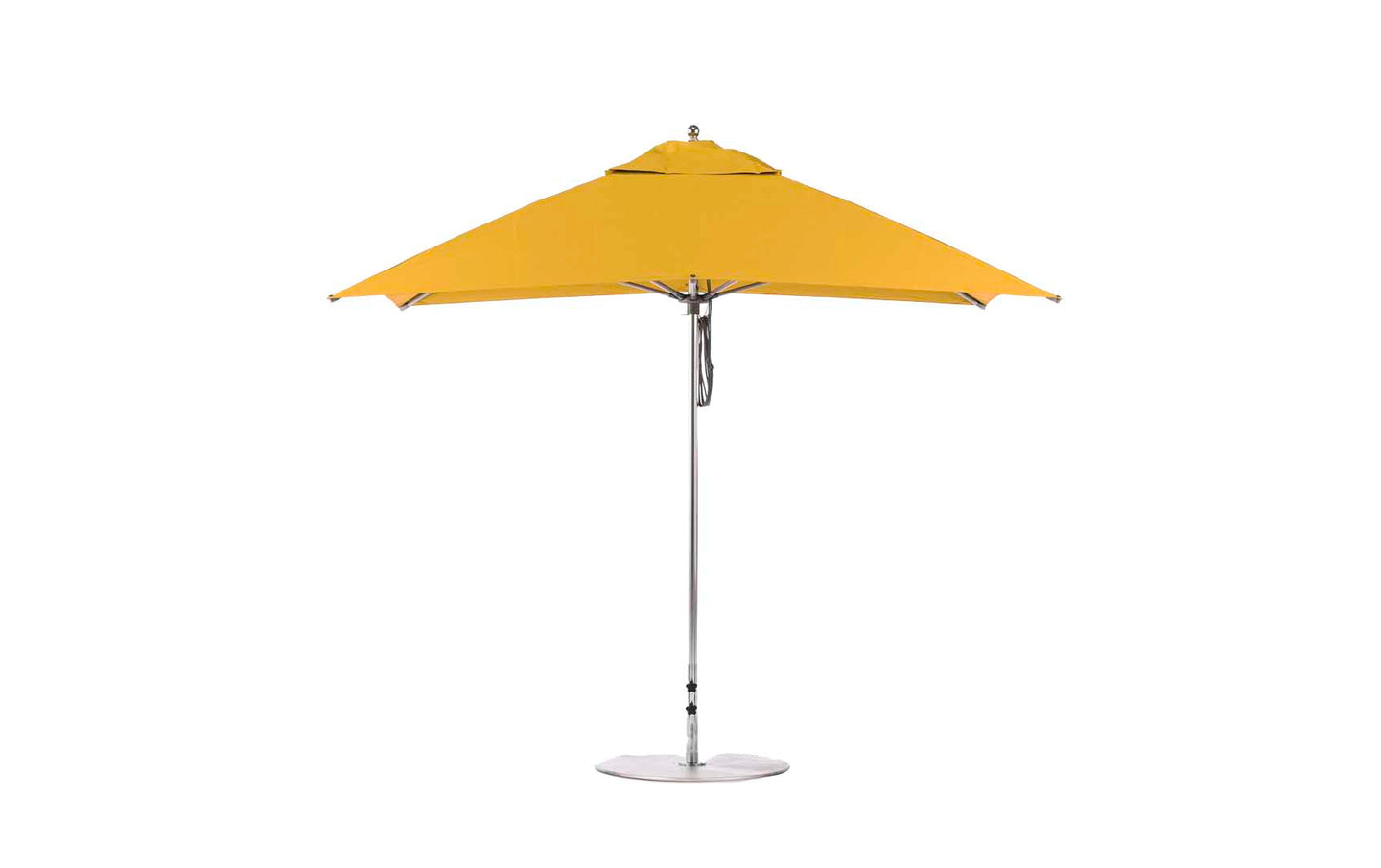 A tall, silver pole supports the Essential Fiberglass Umbrella - 10 Square Pulley by Ledge Lounger, featuring a large yellow canopy crafted from marine-grade fabrics. It stands on a circular base designed for outdoor use.