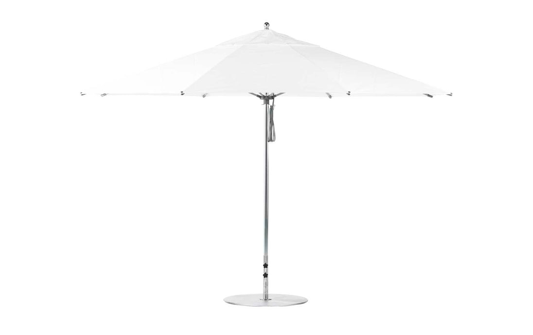 The Ledge Loungers Essential Fiberglass Umbrella features a 13 octagon canopy crafted from marine-grade fabric, paired with a slender silver pole and round base stand. Fully open, its minimalist and sleek design is perfect for patios.