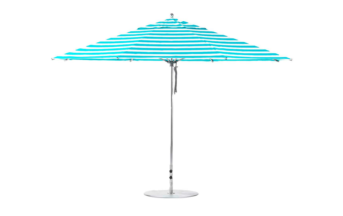 The Ledge Lounger Essential Fiberglass Umbrella, featuring marine-grade fabrics in blue and white stripes, a durable aluminum pole, and a round base, is elegantly showcased against a plain white background.