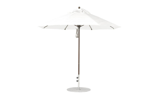 The Essential Fiberglass Umbrella - 9 Octagon Pulley by Ledge Lounger features a wide canopy, metal pole, and round base. Crafted from marine-grade fabrics in a large white design, its ideal for any patio or garden setting.