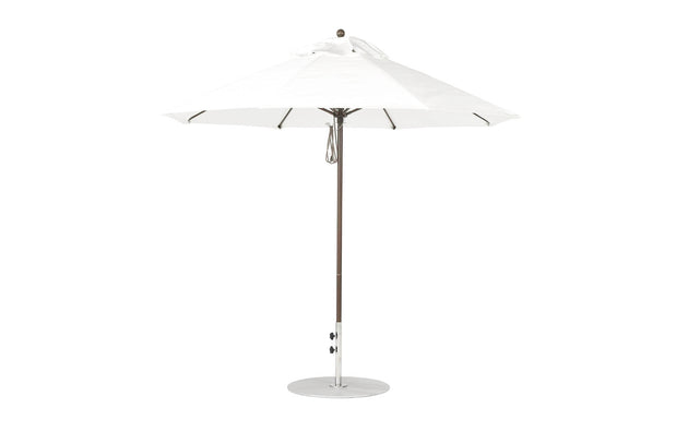 The Essential Fiberglass Umbrella - 9 Octagon Pulley by Ledge Lounger features a wide canopy, metal pole, and round base. Crafted from marine-grade fabrics in a large white design, its ideal for any patio or garden setting.