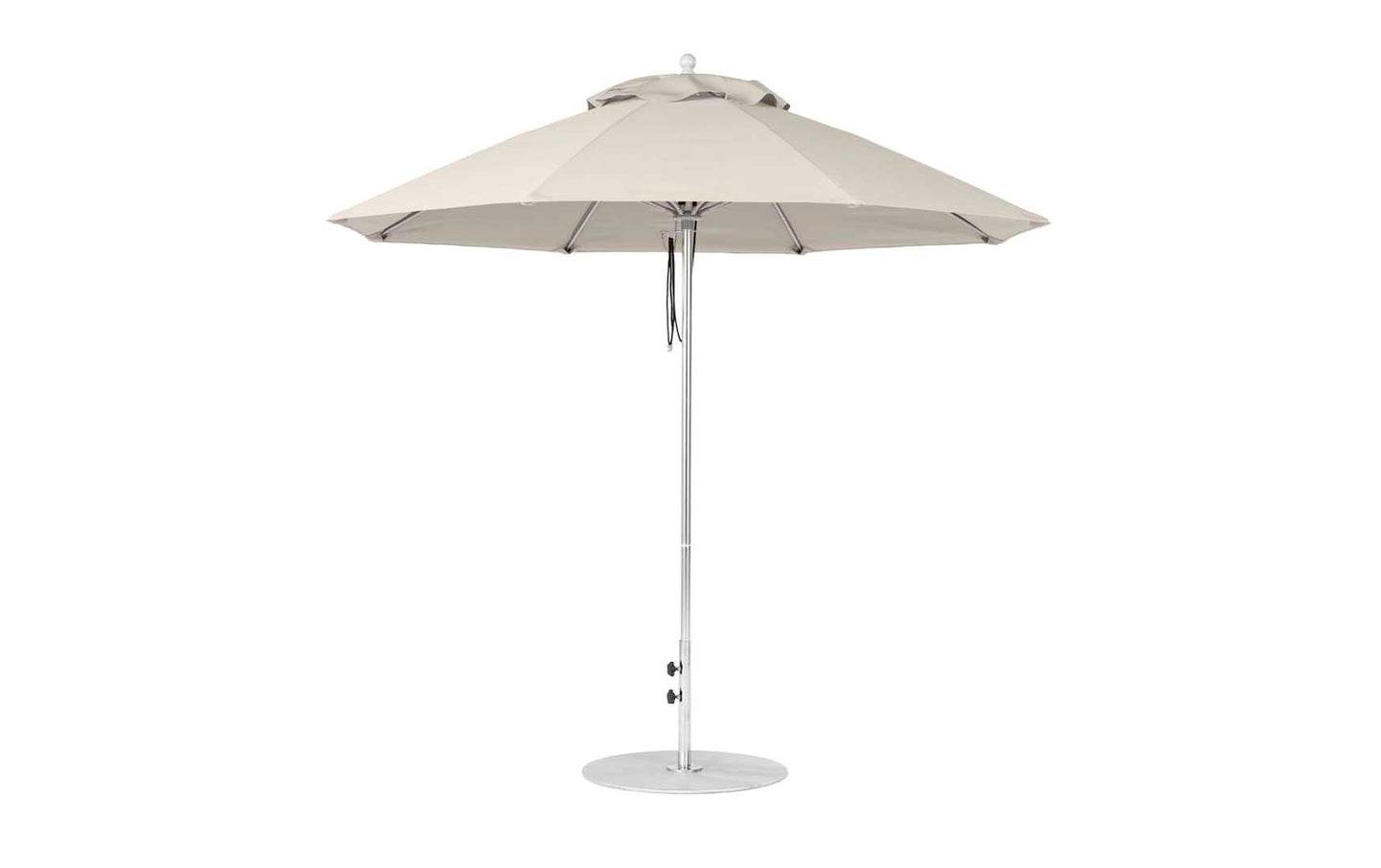 The Ledge Lounger Essential Fiberglass Umbrella features a beige canopy, sturdy aluminum pole with adjustable height, marine-grade fabrics for durability, and a round base for stability on flat surfaces.